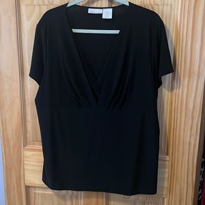 Black shirt sleeve top - looks great under a business suit